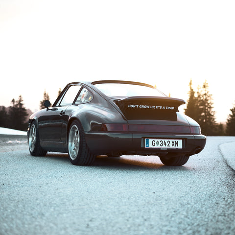 “Don’t Grow Up, It’s A Trap” – Spoiler Sticker for Porsche (964–992)